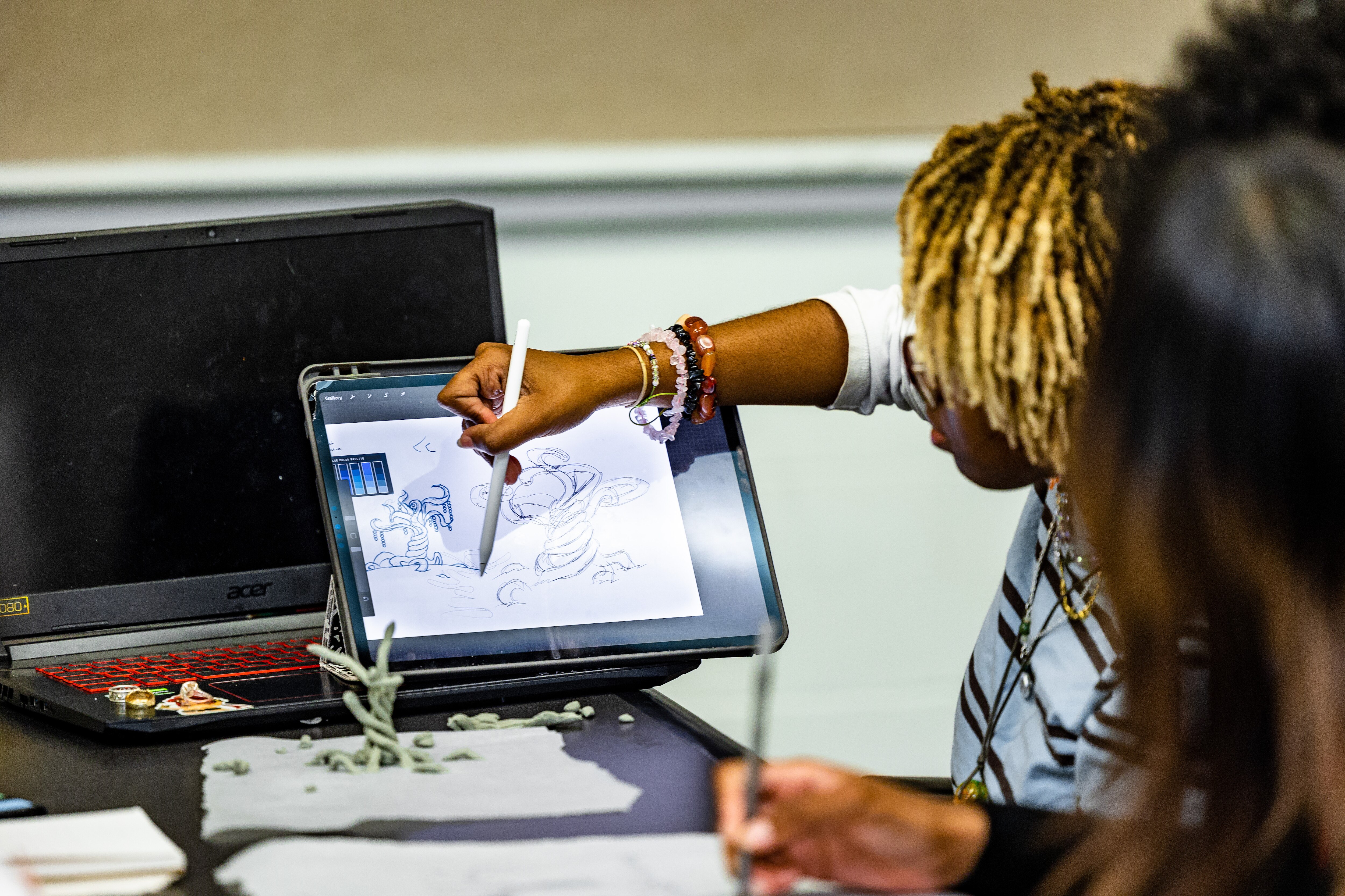 University of Memphis students collaborate on different ideas for the BlueOval City sculpture.
